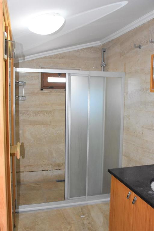 Koupelna v ubytování Dinara Hotel