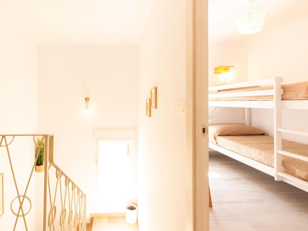 Posteľ alebo postele v izbe v ubytovaní Casa La Alberquilla