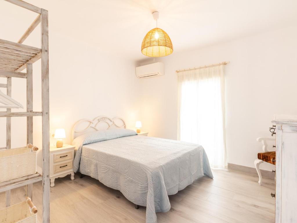 Posteľ alebo postele v izbe v ubytovaní Casa La Alberquilla