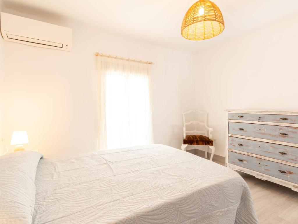 Posteľ alebo postele v izbe v ubytovaní Casa La Alberquilla