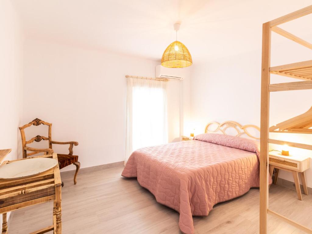 Posteľ alebo postele v izbe v ubytovaní Casa La Alberquilla
