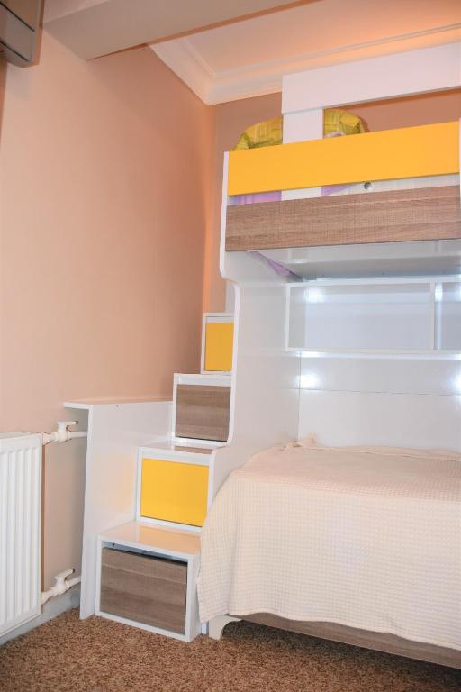 Postel nebo postele na pokoji v ubytování Dinara Hotel