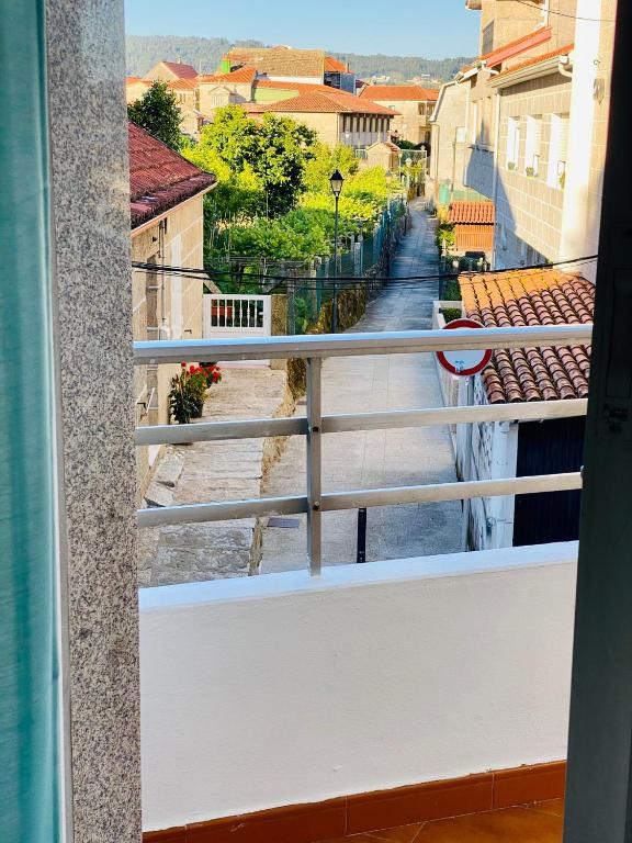 Balkón nebo terasa v ubytování Combarro Suite