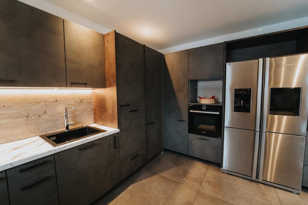 Kuchyň nebo kuchyňský kout v ubytování Apartklusiv Kaltenbach