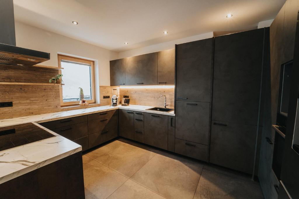 Kuchyň nebo kuchyňský kout v ubytování Apartklusiv Kaltenbach