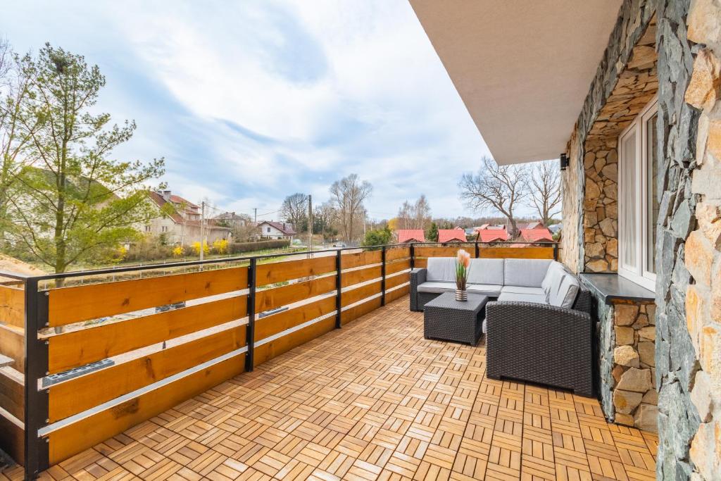 Balkón nebo terasa v ubytování VIP House Apartamenty