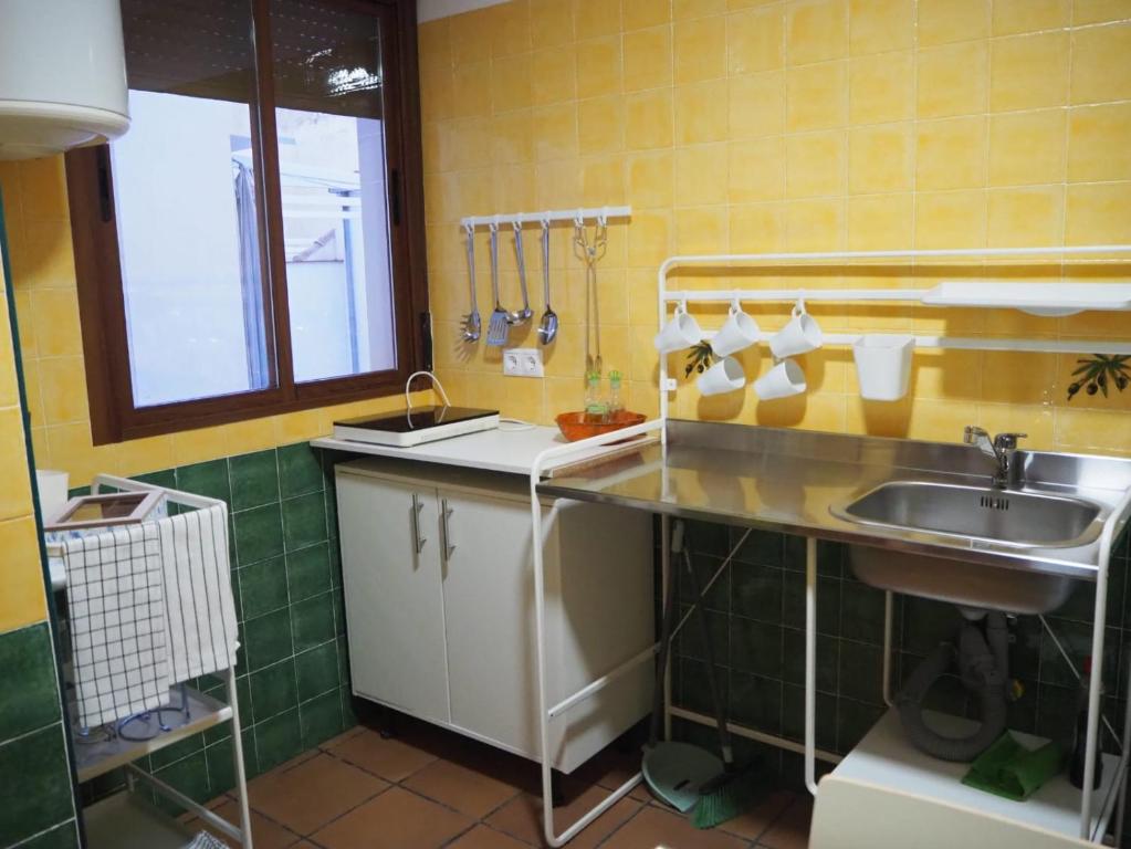 Kuchyň nebo kuchyňský kout v ubytování Sendero de la Subbetica - Apartamentos Turisticos en Zuheros - Holiday Home
