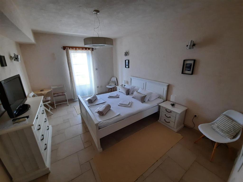 Postel nebo postele na pokoji v ubytování Apartments Jelena Skver
