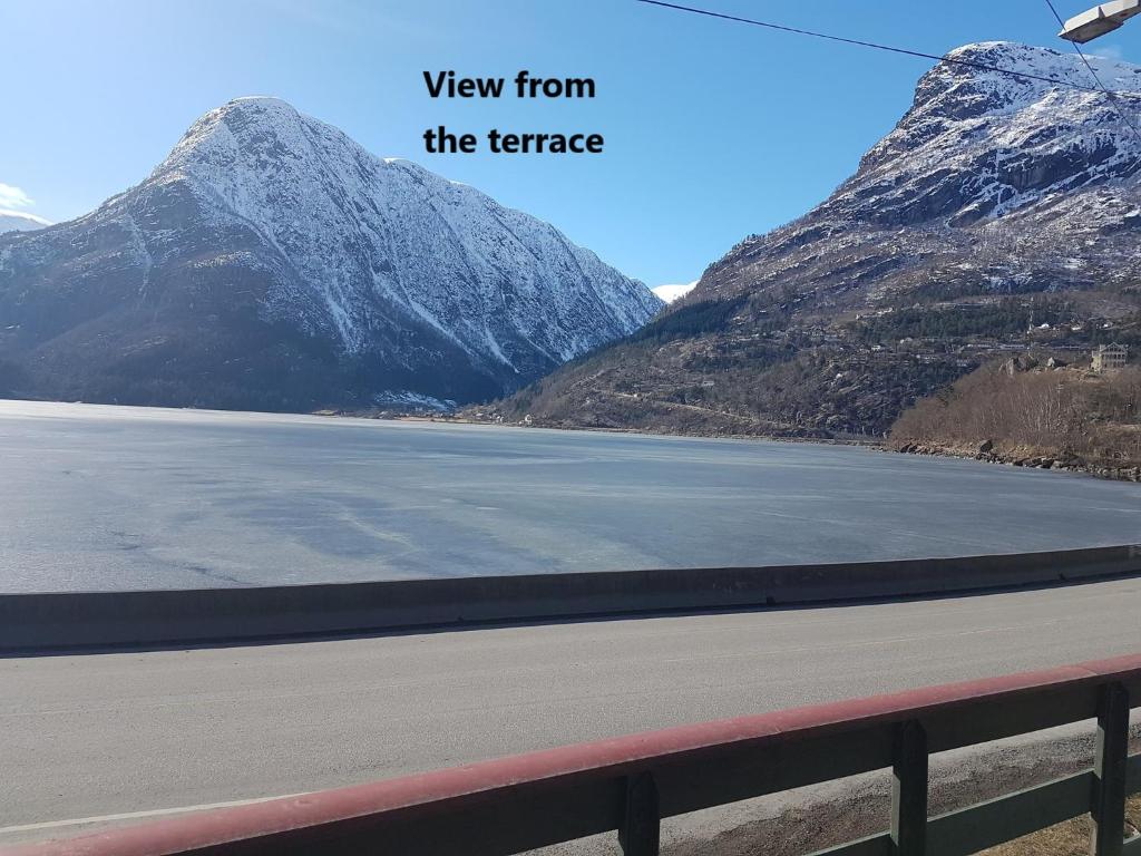 a view from the terrace of a mountain at Vasstun Panorama in Odda