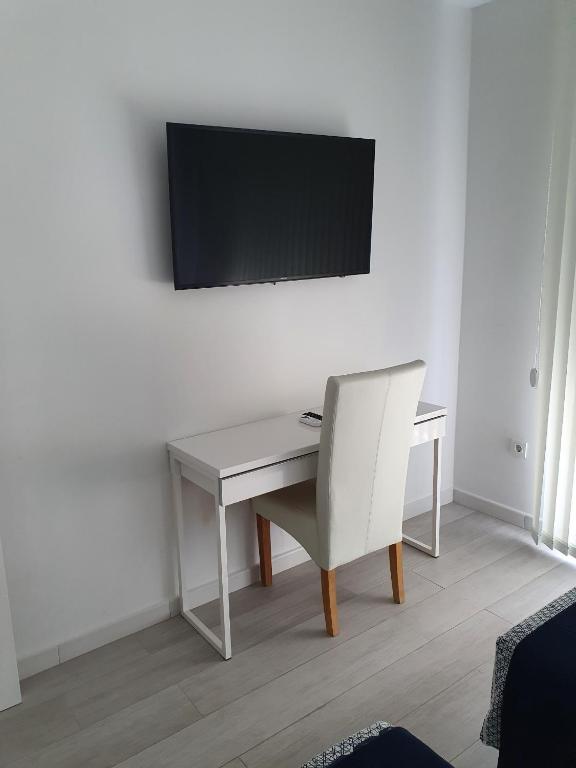 Telewizja i/lub zestaw kina domowego w obiekcie Paraiso