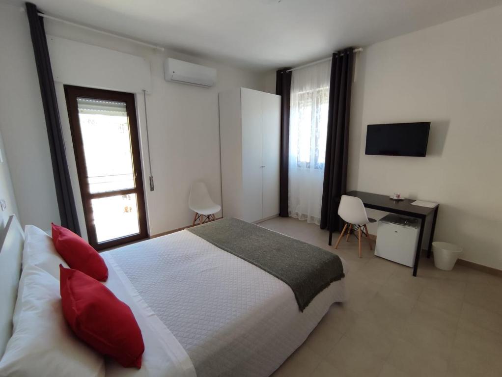 Posteľ alebo postele v izbe v ubytovaní Cristian Rooms