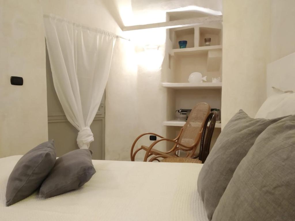 Postel nebo postele na pokoji v ubytování Mèna Mè - Casa vacanza - Salento