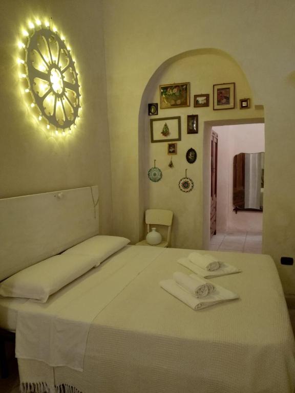 Postel nebo postele na pokoji v ubytování Mèna Mè - Casa vacanza - Salento