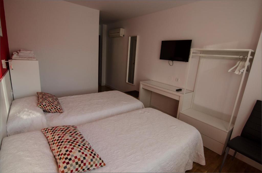 Postel nebo postele na pokoji v ubytování B&B Zaldu