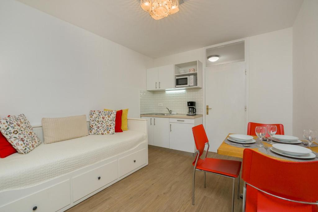 Kuchyň nebo kuchyňský kout v ubytování Apartments Zicara