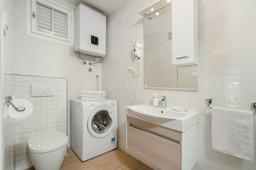 Koupelna v ubytování Apartments Zicara