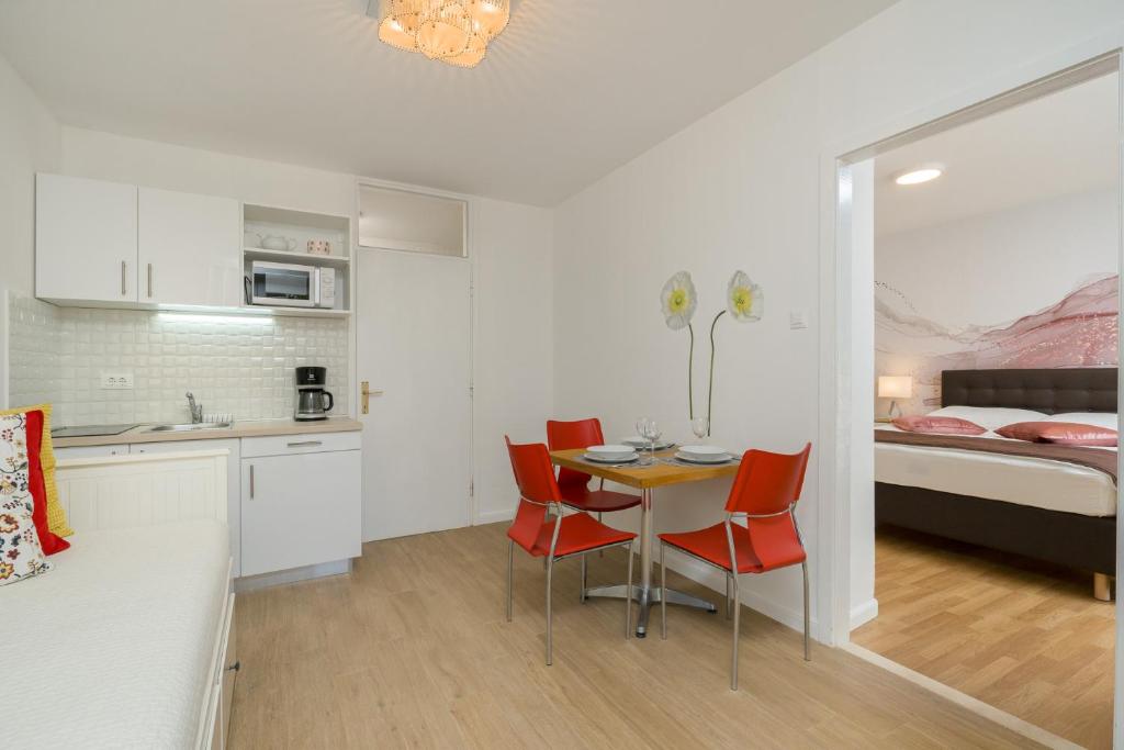 Kuchyň nebo kuchyňský kout v ubytování Apartments Zicara