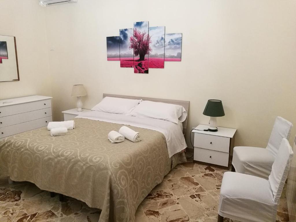 Posteľ alebo postele v izbe v ubytovaní Casa Mia, vacanze