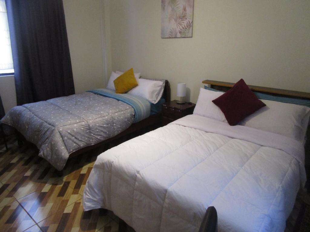 Letto o letti in una camera di jazmines point