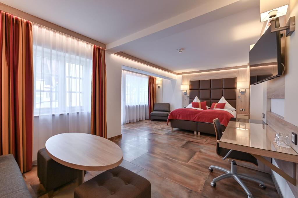 Postel nebo postele na pokoji v ubytování Hotel Ludwigs