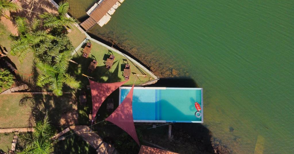 an overhead view of a building next to the water at La Wayaba in Hernandarias