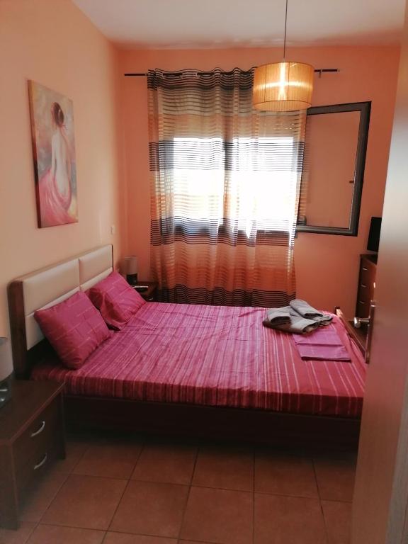 Posteľ alebo postele v izbe v ubytovaní Enoikiazomena diamerismata mezonetes Giannakoudis ΝΟ5
