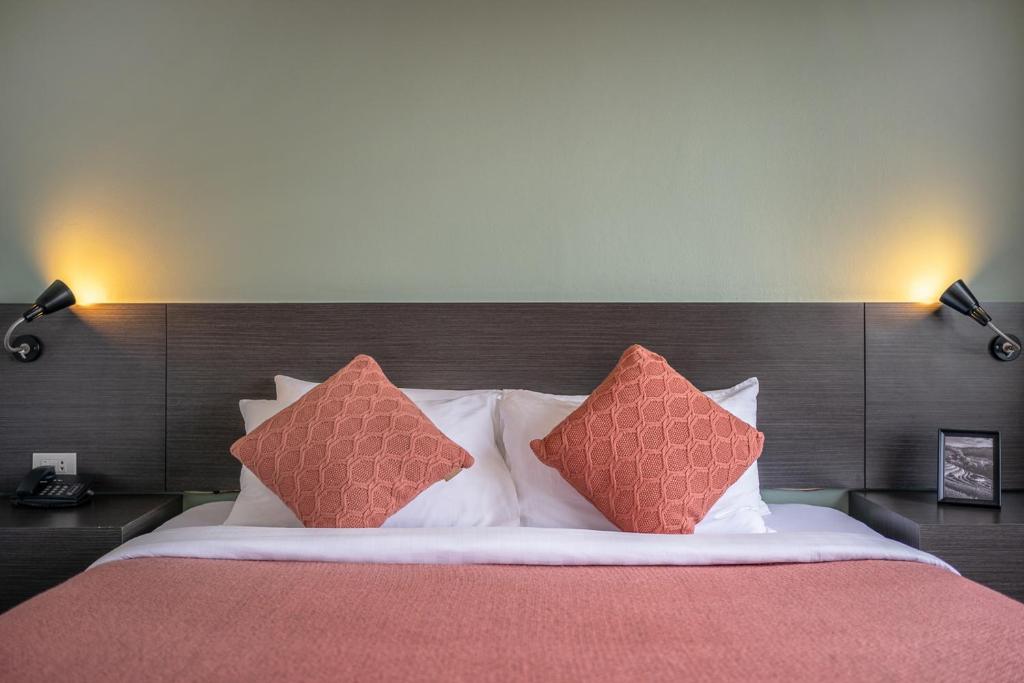 Postel nebo postele na pokoji v ubytování I Pavilion Hotel Phuket