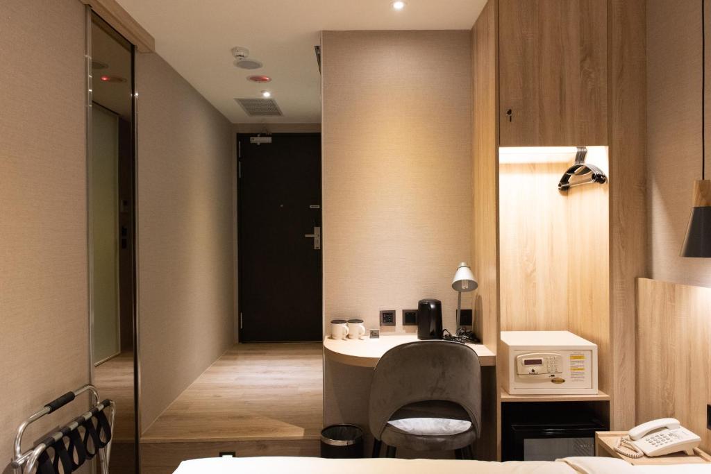 Postel nebo postele na pokoji v ubytování N Hotel