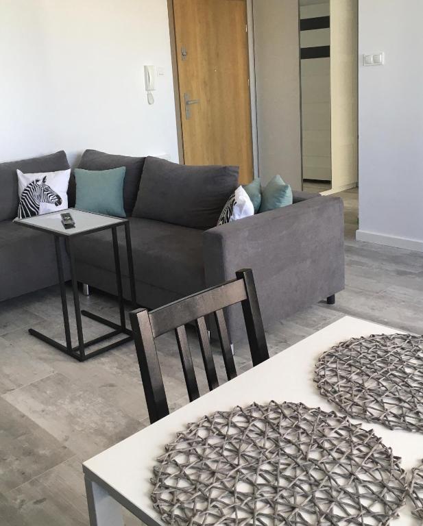 Posedenie v ubytovaní Apartament Miętowa Zebra