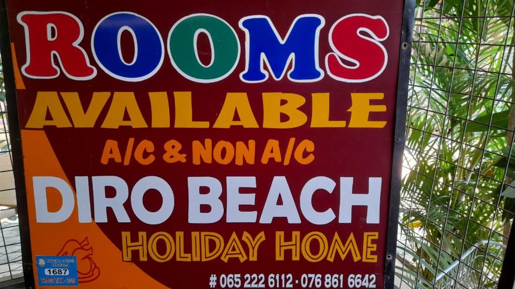 a sign for arosias available dip beach holiday homes at DERO BEACH HOLIDAY HOME in Batticaloa