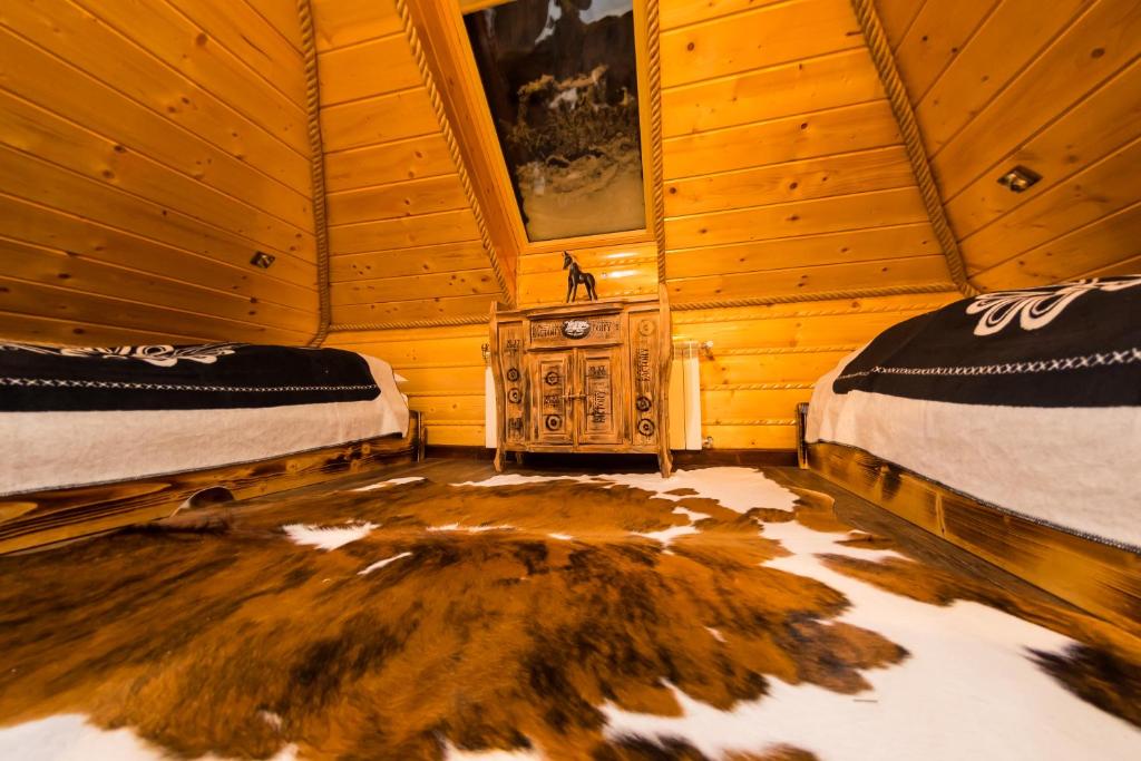 Postel nebo postele na pokoji v ubytování U Tadka dom z jacuzzi na zielonej