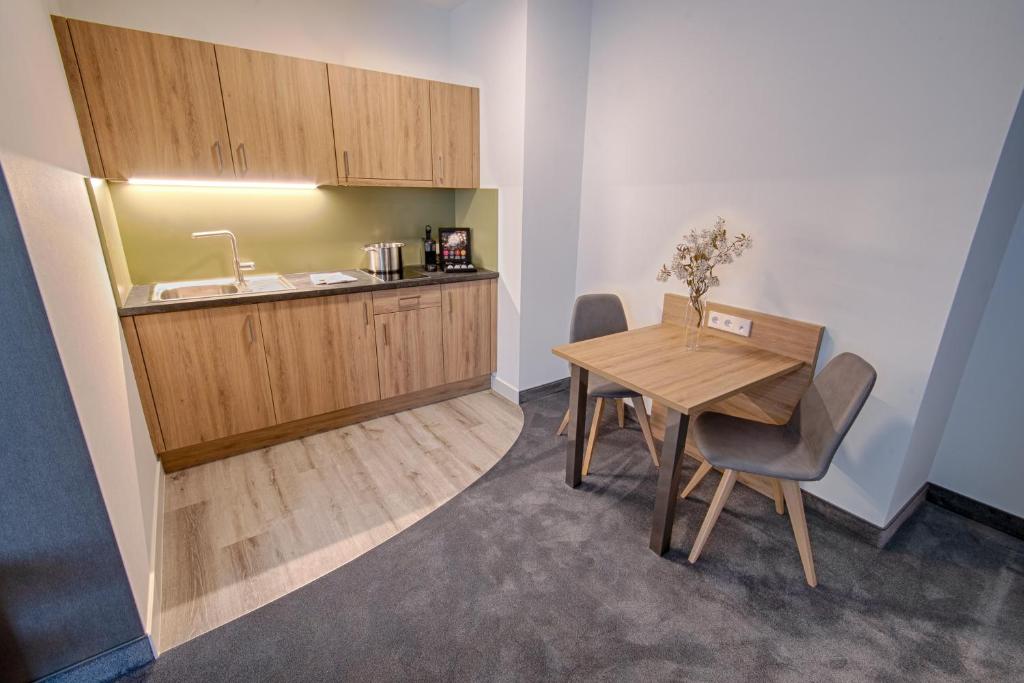 Kuchyň nebo kuchyňský kout v ubytování Hotel Kupferzell