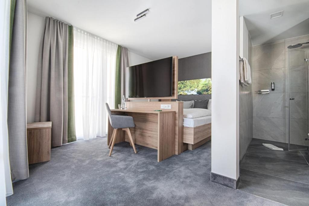 Postel nebo postele na pokoji v ubytování Hotel Kupferzell