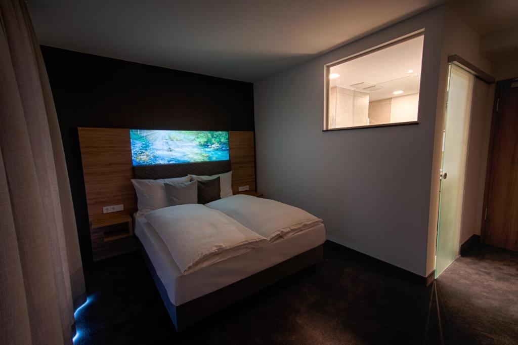 Postel nebo postele na pokoji v ubytování Hotel Kupferzell