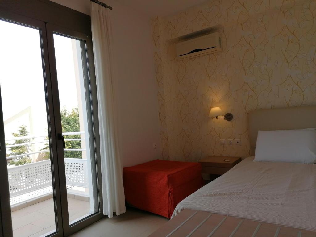 Łóżko lub łóżka w pokoju w obiekcie Salvia Villas