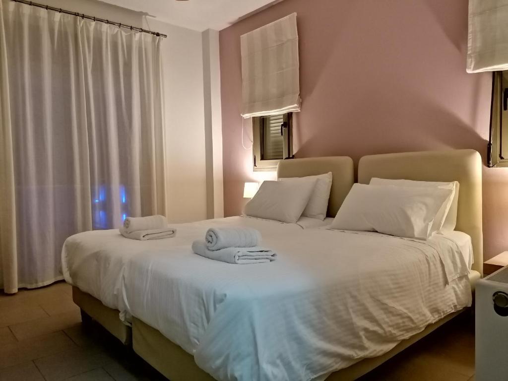 Łóżko lub łóżka w pokoju w obiekcie Salvia Villas
