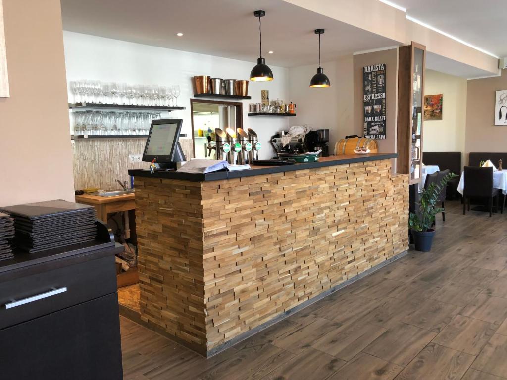 Reštaurácia alebo iné gastronomické zariadenie v ubytovaní Apartments CITY Stadion