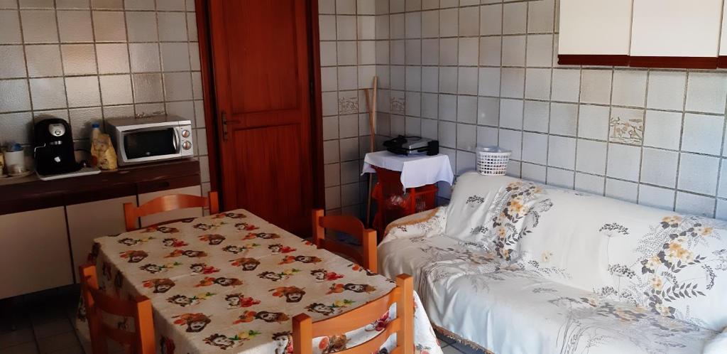 Postel nebo postele na pokoji v ubytování Siculiana Homelidays