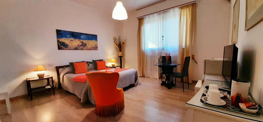 Postel nebo postele na pokoji v ubytování Belvedere del Lago