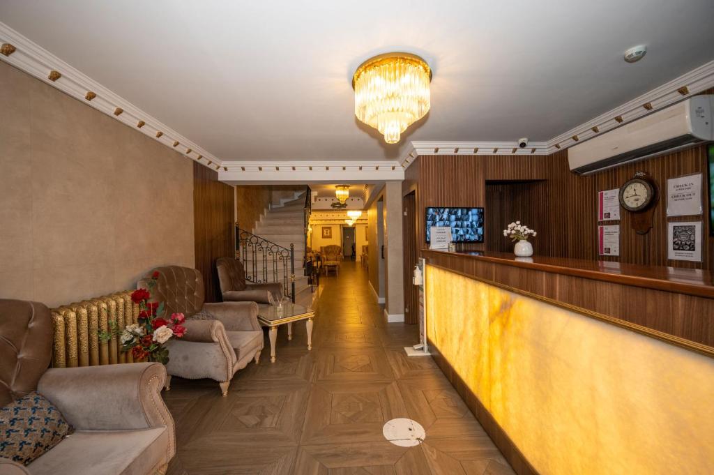 TV a/nebo společenská místnost v ubytování Hotel Melita