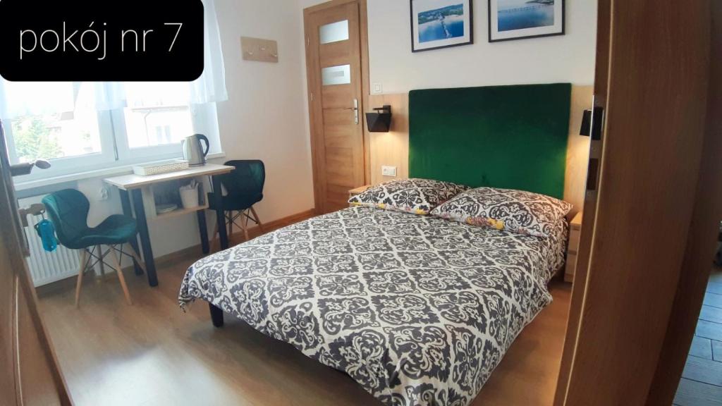 Posteľ alebo postele v izbe v ubytovaní Pokoje Gościnne Gąsowscy Dzieci od 12 roku życia