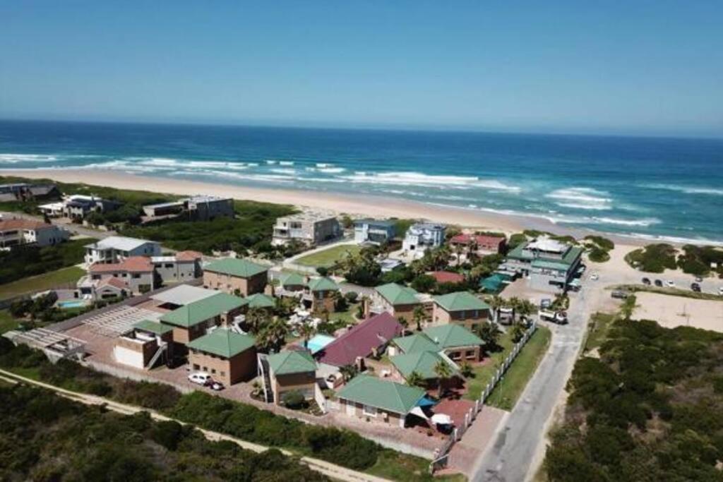 an aerial view of a resort near the beach at Seaside Vacation Studio @ Shearwater Myoli Beach in Sedgefield