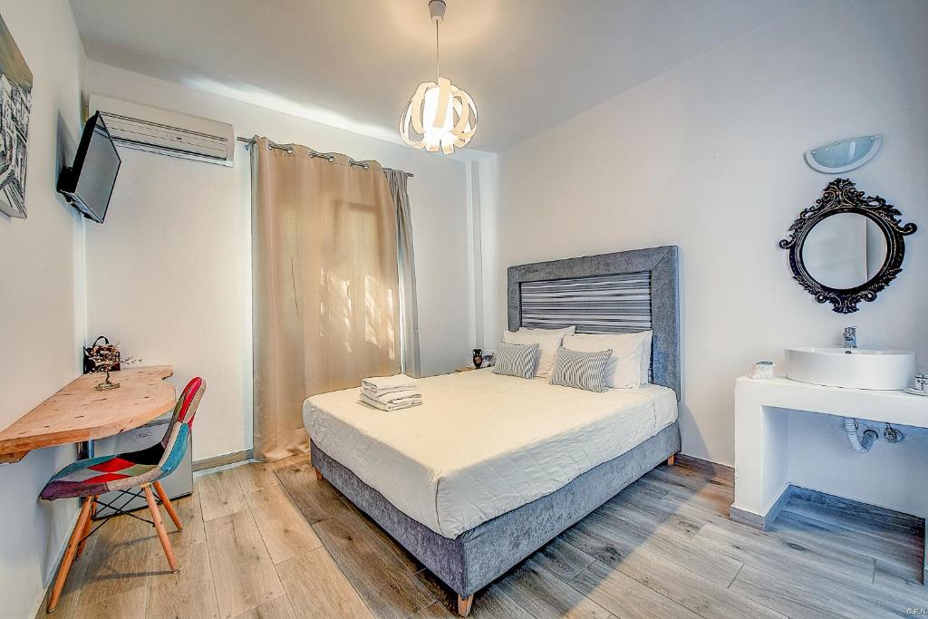 Ένα ή περισσότερα κρεβάτια σε δωμάτιο στο Anamar Blu