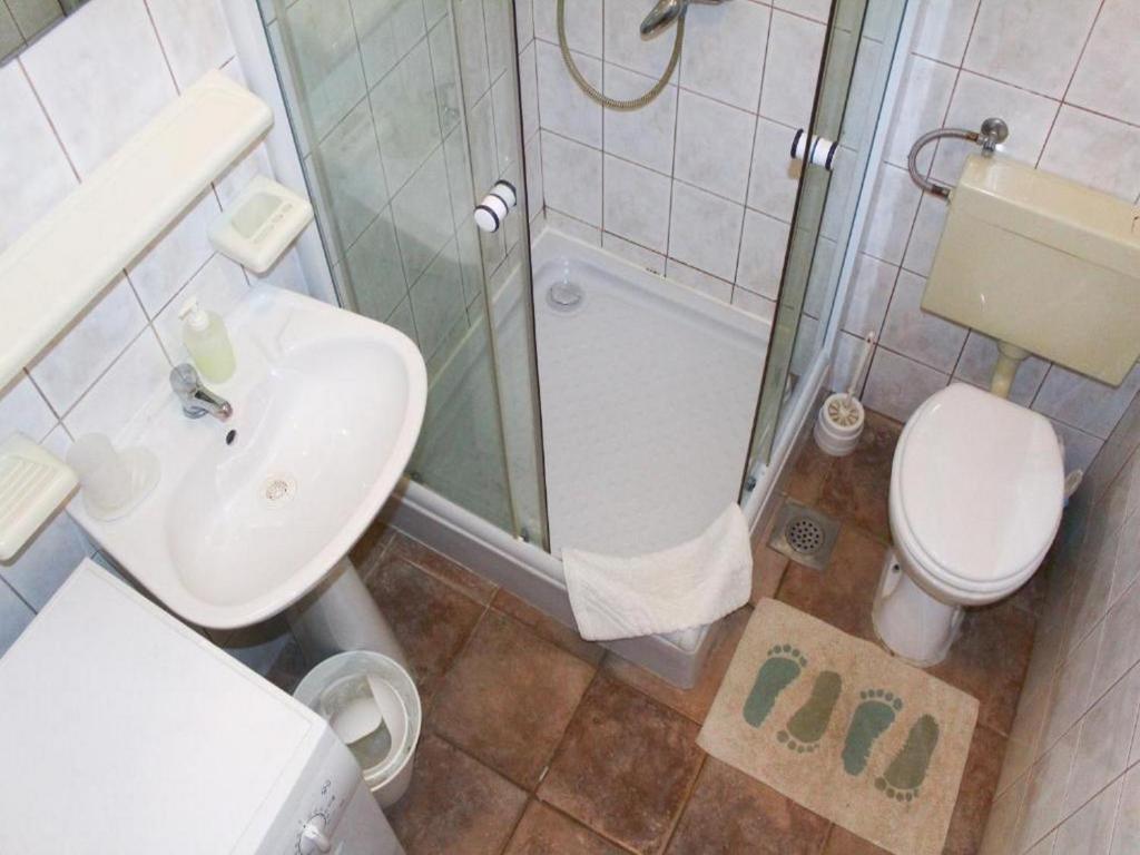 Łazienka w obiekcie Apartmani Lucia Biograd