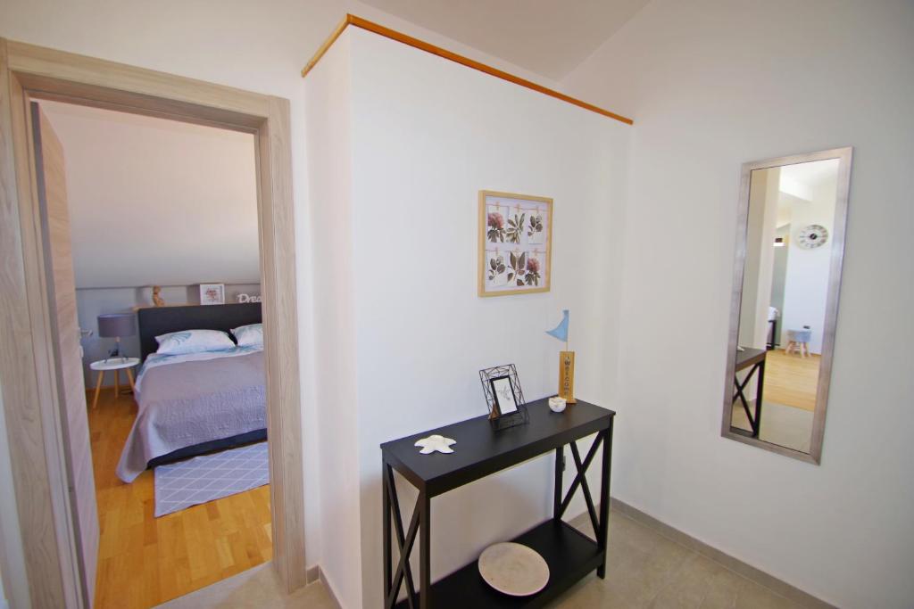 Posteľ alebo postele v izbe v ubytovaní Apartman Luci
