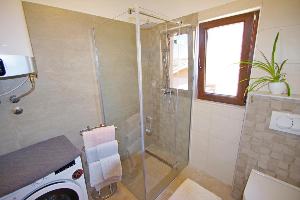 Kúpeľňa v ubytovaní Apartman Luci