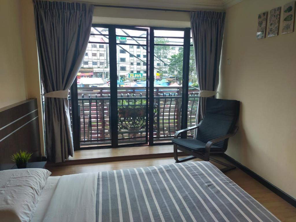 Postel nebo postele na pokoji v ubytování Hong Kong Hotel