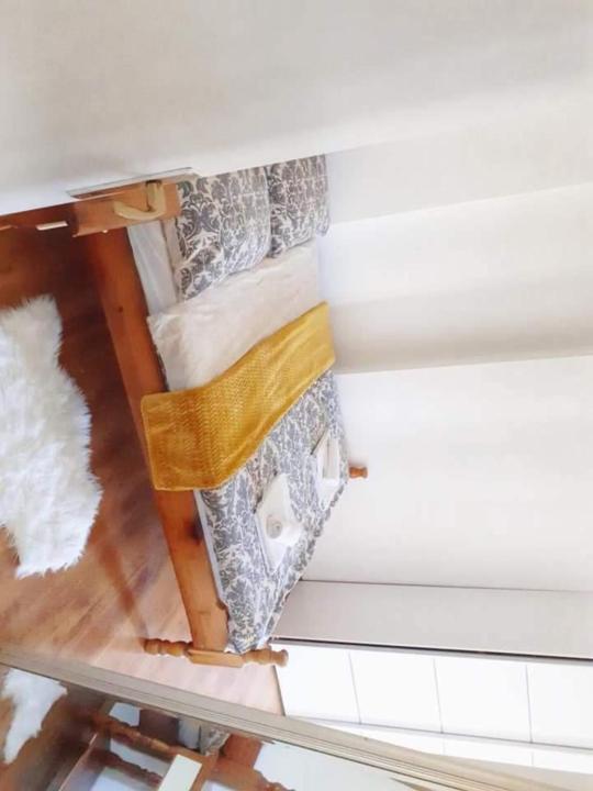 Palanda nebo palandy na pokoji v ubytování Apartments Esperanza
