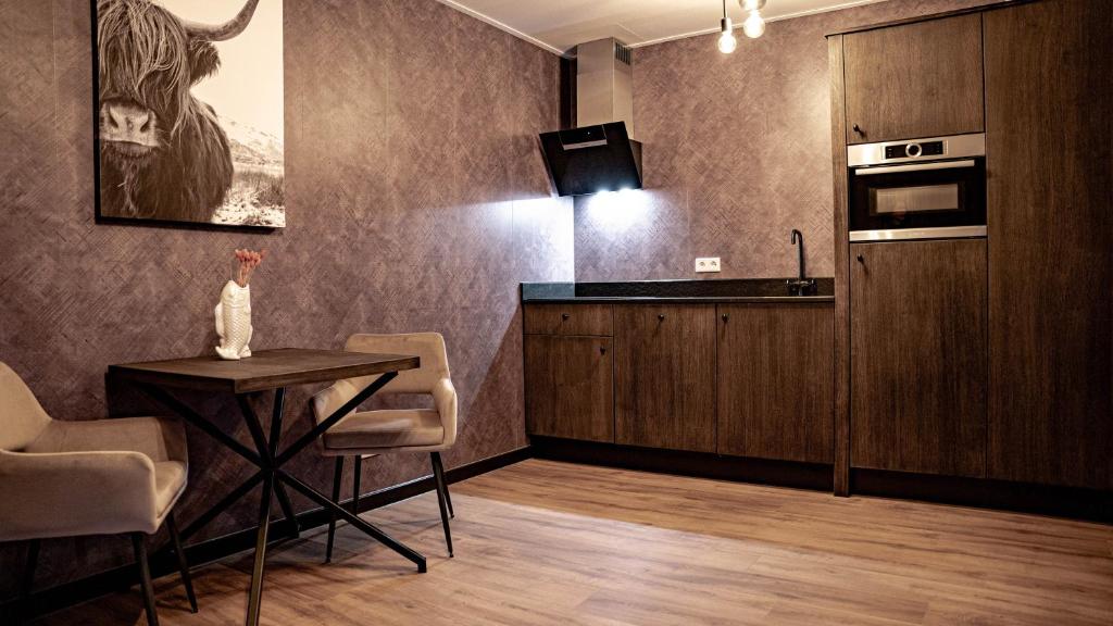 Kuchyň nebo kuchyňský kout v ubytování Hotel Biesbosch