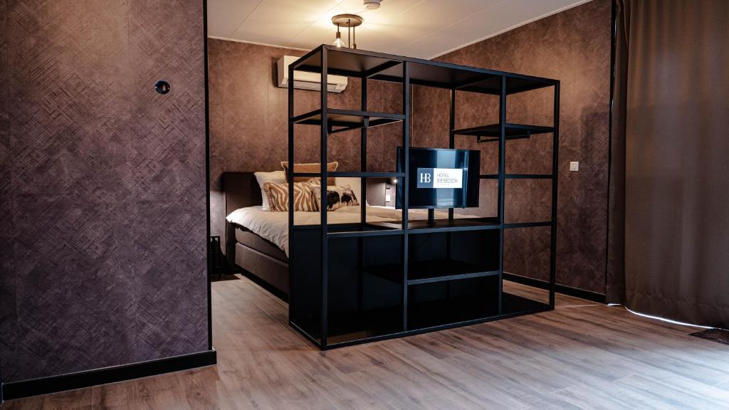 Postel nebo postele na pokoji v ubytování Hotel Biesbosch